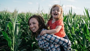 Nancy Bohl Bormann and her daughter on their family farm